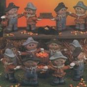 D1196- 4 Hand in Hand Scarecrows 22cm
