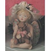 S2733-Sitting Cherub Crossed Legs Arms with Teddy 17cm