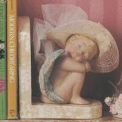 S2739-Sleeping Cherub Facing Right 14cm