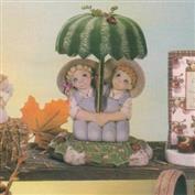 D1667ST -Parasol Pal Kids 15cmH with Ivy Base 21cmW, Watermelon Parasol 15cmW & Brass Rod 22cm High