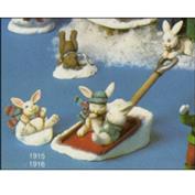 S1916 - Bunny Sitting on Handle with Snow Shovel